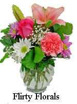 Make the day special by sending that special someone our flirty floral vase arrangement