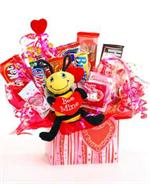 Our “Sweet Sweet Love” candy bouquet is filled with everyone's favorite. From chocolate bars to hard candies and the Love Bug sitting on the corner, this bouquets says I think you're sweet. Want to make it even sweeter? Why not send one of our flowers bou