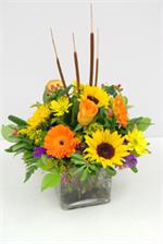 Our Autumn Sunset arrangement is filled with all the autumn colors.