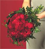 Red miniature carnations, with burgundy standard carnations, ivy stems and galax leaves.