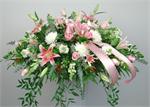 Our Heartfelt Expression is a full size casket piece designed with pink Oriental Lilies, pink roses, white snapdragons, white full size mums, berries, baby eucalyptus with mixed greens and Italian ruscue with a touch of baby breath. Included in the design