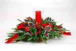 Deliver holiday joy with this truly original classic.  Arranged with fragrant Christmas greens, holly,