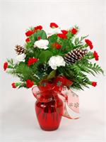 Red Holiday vase filled with red and white carnations, with holiday greens, pine cones, holly, and baby breath