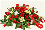 Twenty-four long stem red roses with white asiatic lilies, white spider mums, baby eucalyptus, mixed greenery and  ribbons with your choice of script.