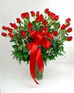 Make the occasion extra special with this striking arrangement of 36 premium long stem roses, arranged in a glass garden vase with mixed greens and baby breath. For anniversaries, birthdays, or no reason, sending a arrangement of three dozen roses says th